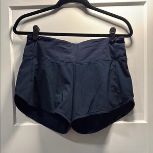 Lululemon Speed Up 4” inseam, mid rise. Navy blue